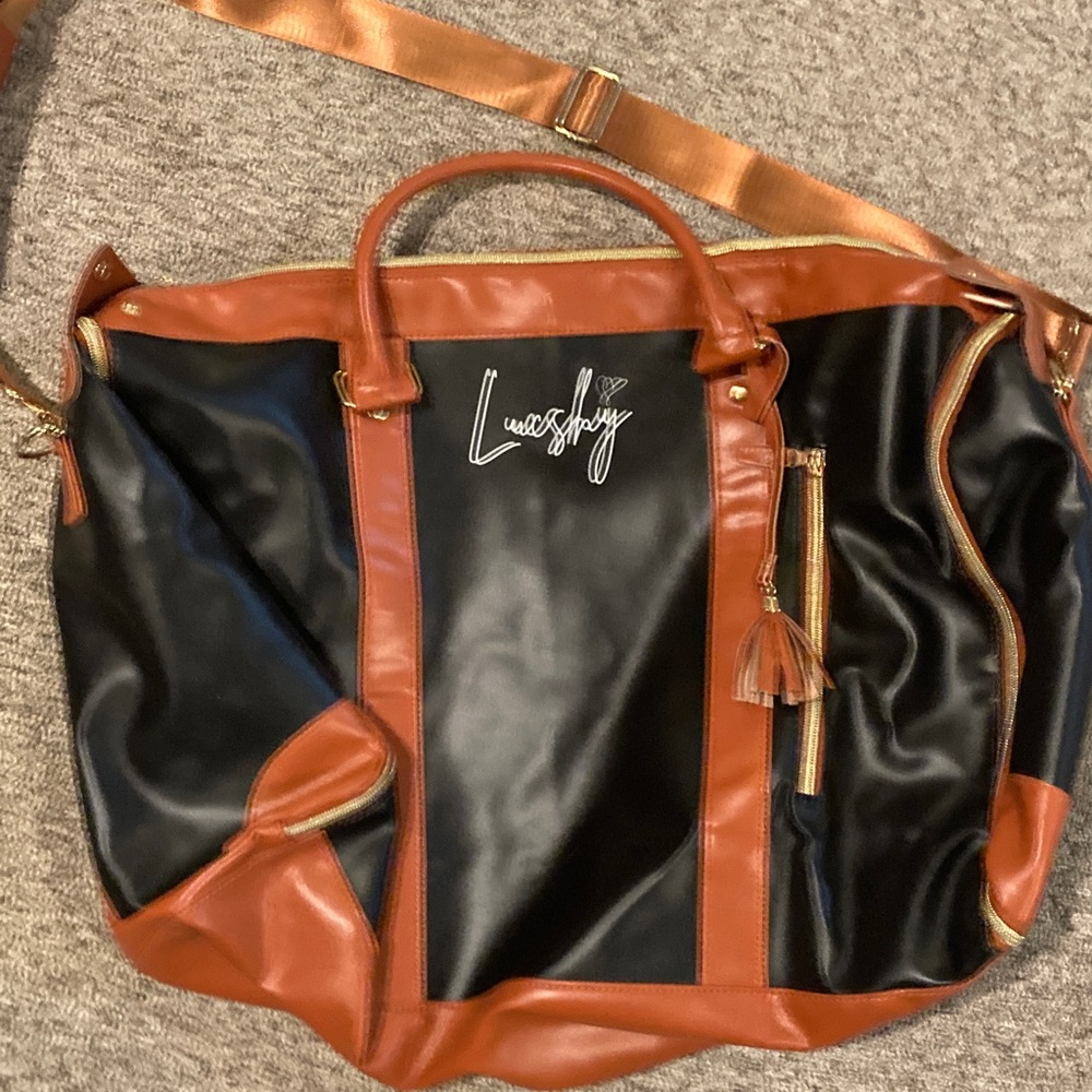 Lucshy dufflebag carry-on- garment bag and duffle in one